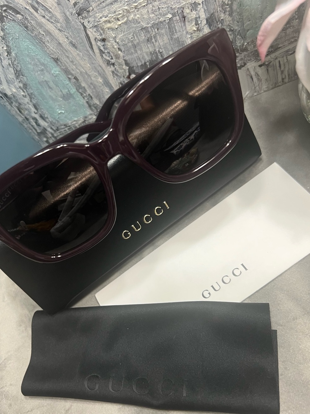 Gucci sunglasses NWOT
Deep purple in color